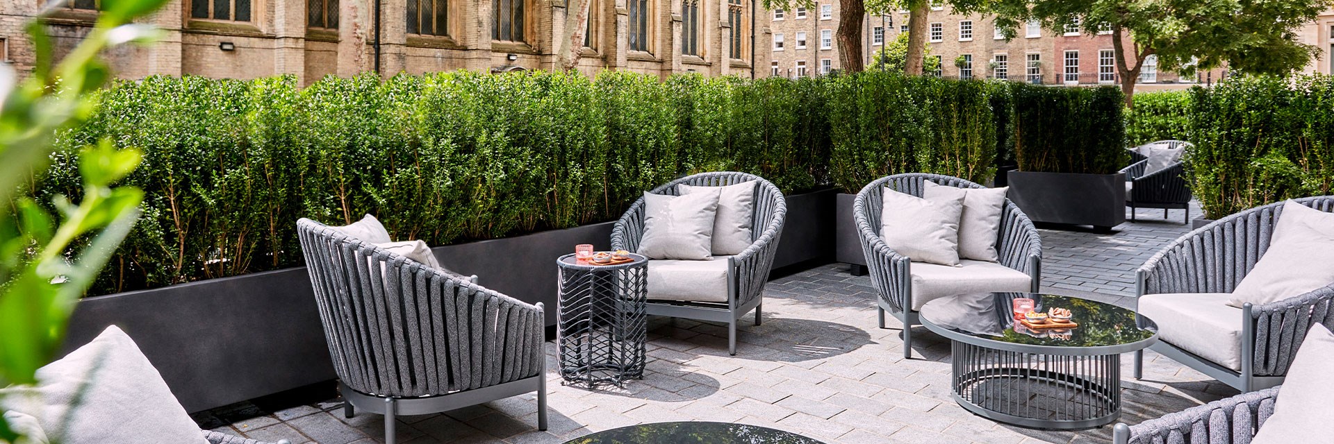 The Berkeley Bar & Terrace: vie wof terrace with grey alfresco tables an chairs.