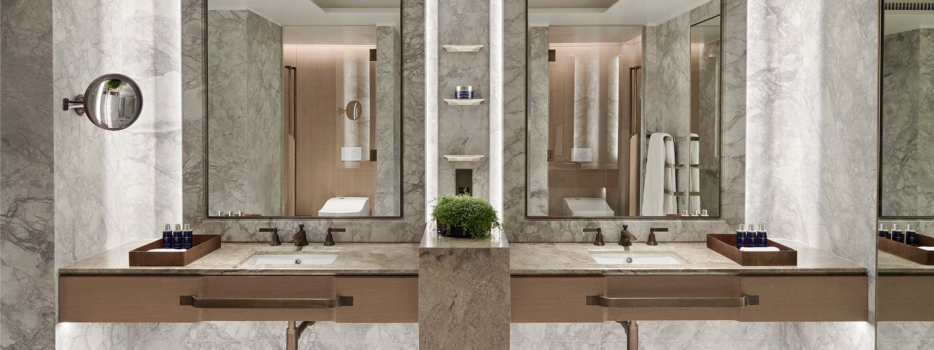 Grand Pavilion Terrace at The Berkeley - bathroom view with marble bath sinks and mirrors on the wall.