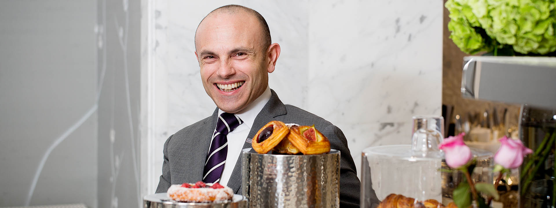 Smiling Antonio Sitzia is ma�tre d' at The Berkeley hotel, photographed in the Collins Room.