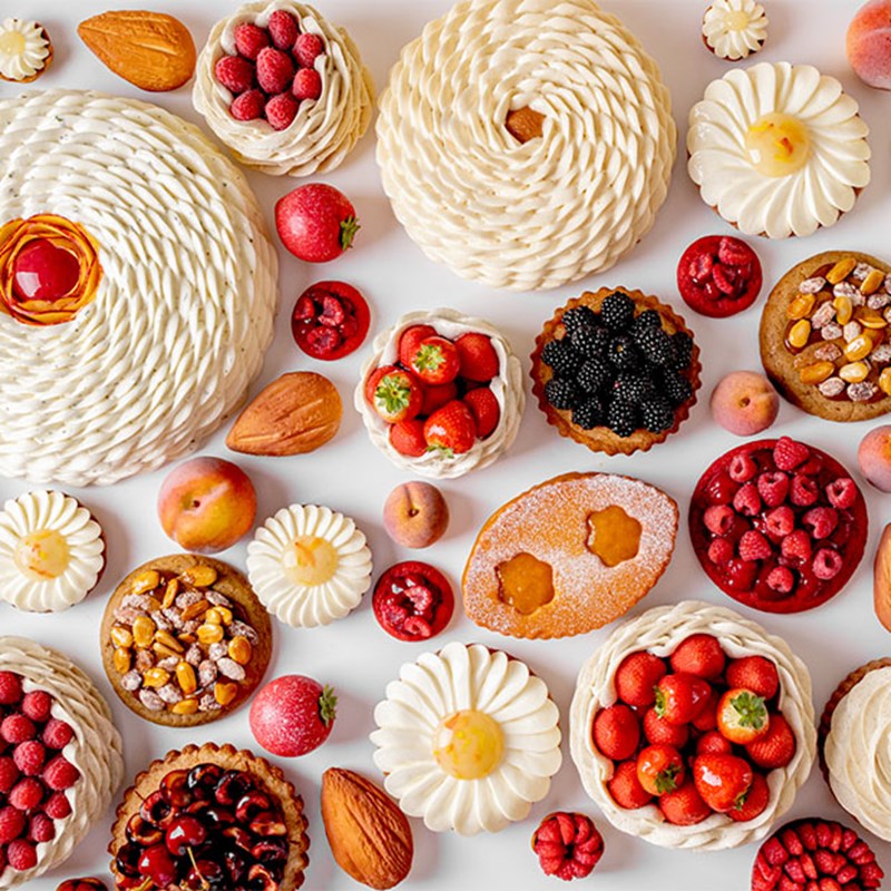 Cedric Grolet summer collection, flat lay of a selection of patisserie.