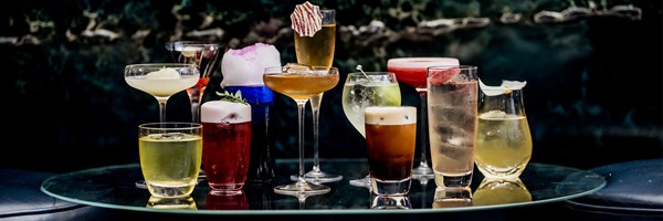 Collection of colourful cocktails lined up as part of the Blue Moves collection