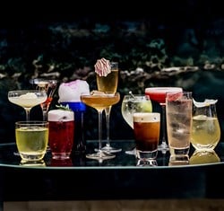 Collection of colourful cocktails lined up as part of the Blue Moves collection