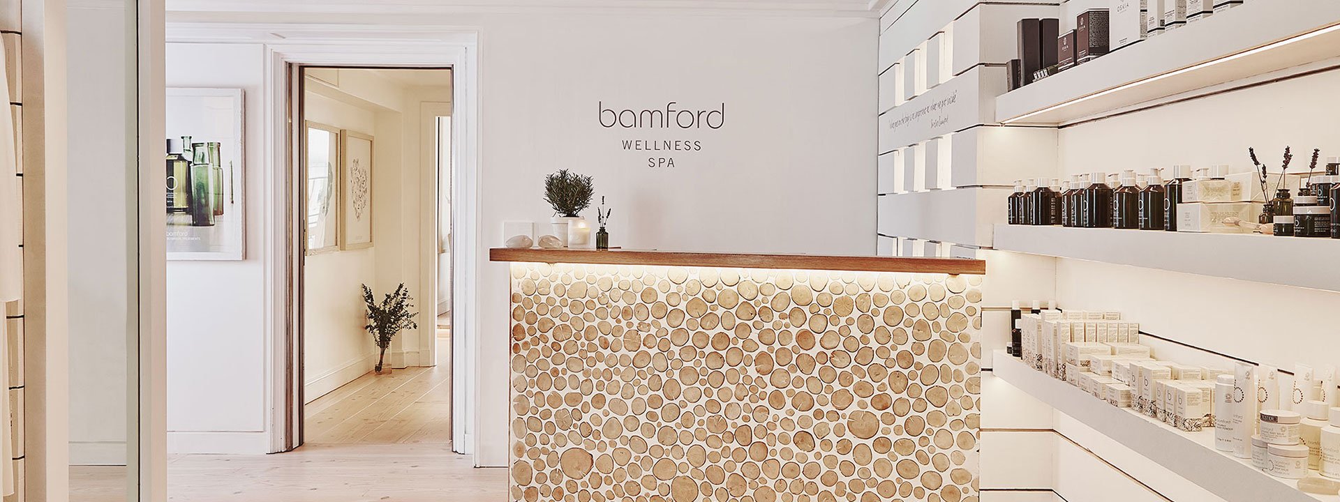 A light-filled space at The Bamford Wellness Spa at The Berkeley, with an array of spa treatment products.