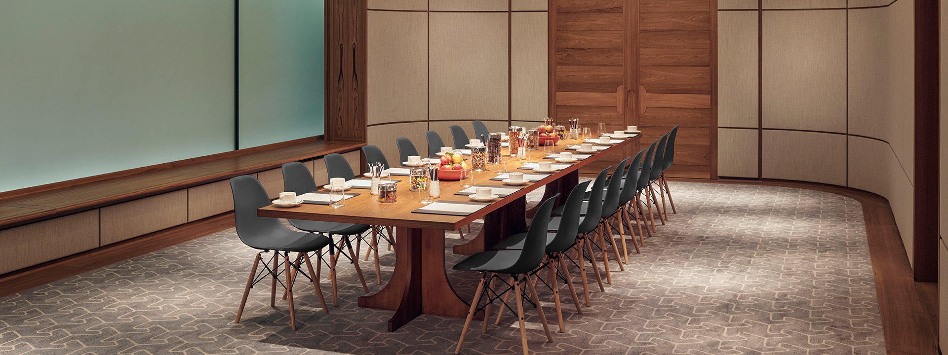 A decorated table surrounded by comfortable grey chairs in The Wilton Room, The Berkeley hotel.