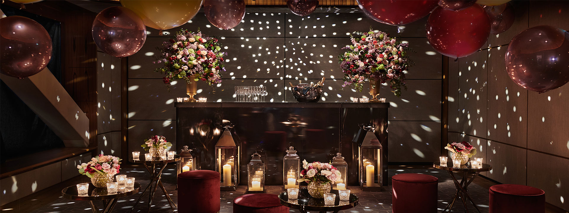 The Knightsbridge Room is decorated with balloons, candles and flowers for a warm and social atmosphere.