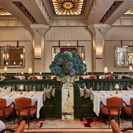 Claridge's Restaurant room with beautiful flowers and table dressed up.