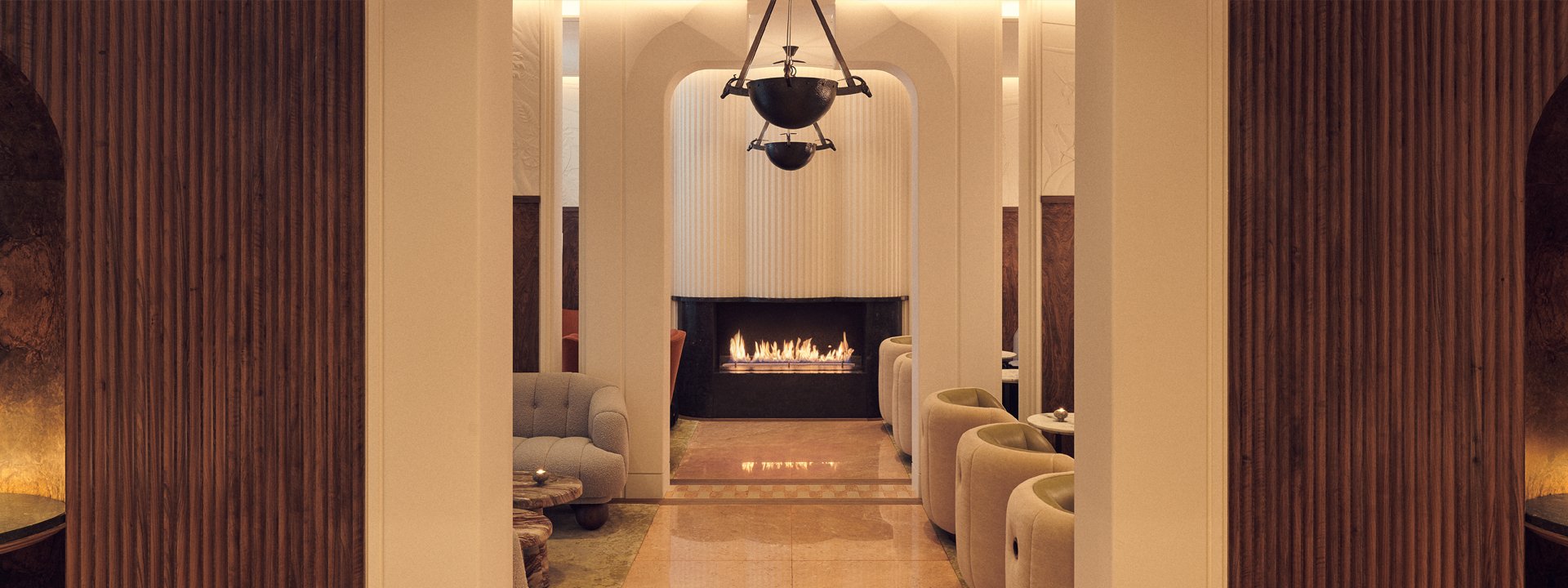 The Berkeley Bar & Terrace interior with plush olive and grey chairs, marble flooring and a fireplace at The Berkeley