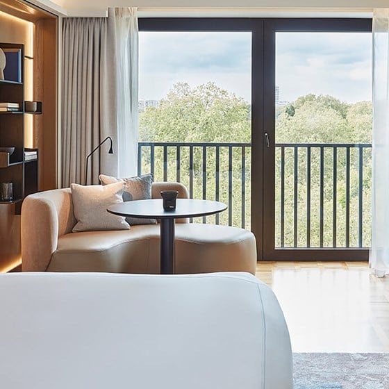 Berkeley Room with a king size bed, table, sofa and view from the window
