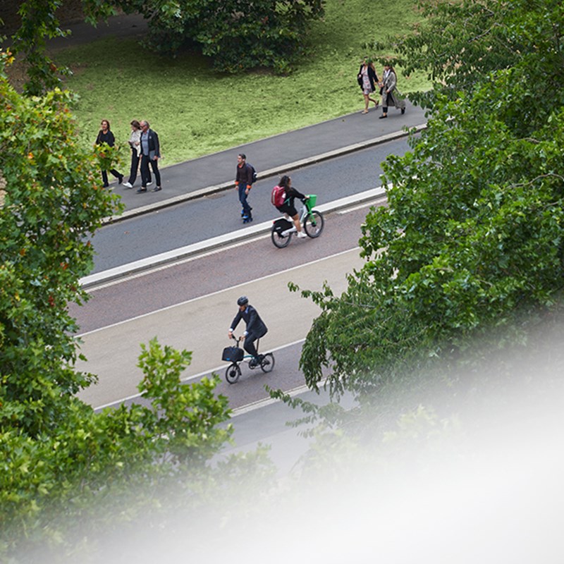 View looking down onto walkers and cyclists in Hyde Park