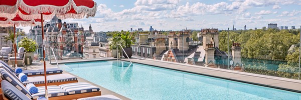 The Berkeley rooftop pool with sunbeds and a parasol